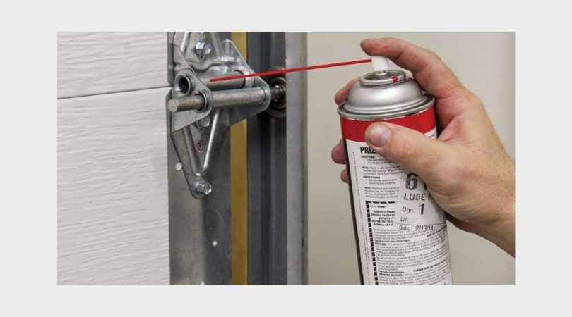 A close-up view of a well-maintained garage door with clearly visible rollers, showing smooth operation. The rollers should appear clean and well-lubricated, emphasizing the importance of proper maintenance for smooth functionality.